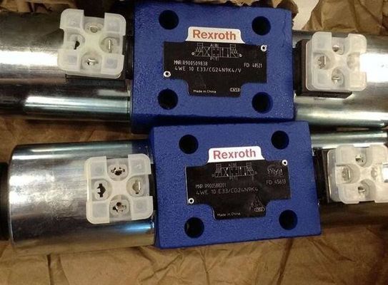 Οι κατευθυντικές βαλβίδες στροφίων Rexroth R900588201 4WE10E3X/CG24N9K4 4WE10E33/CG24N9K4, κατευθύνουν λειτουργημένος, με το σωληνοειδές πραγματικό